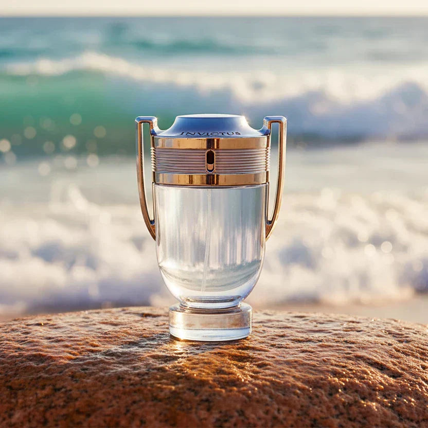 Paco Rabanne Invictus bottle in beach editorial setting
