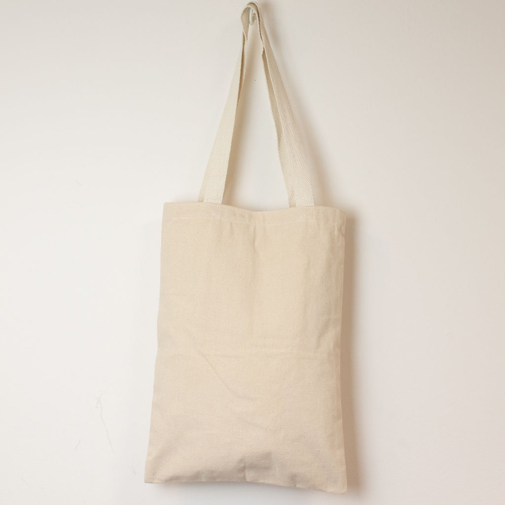 Beige tote bag on a white background