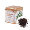 Tea canister labeled 'Mandala Leaves' with tea leaves on a white background