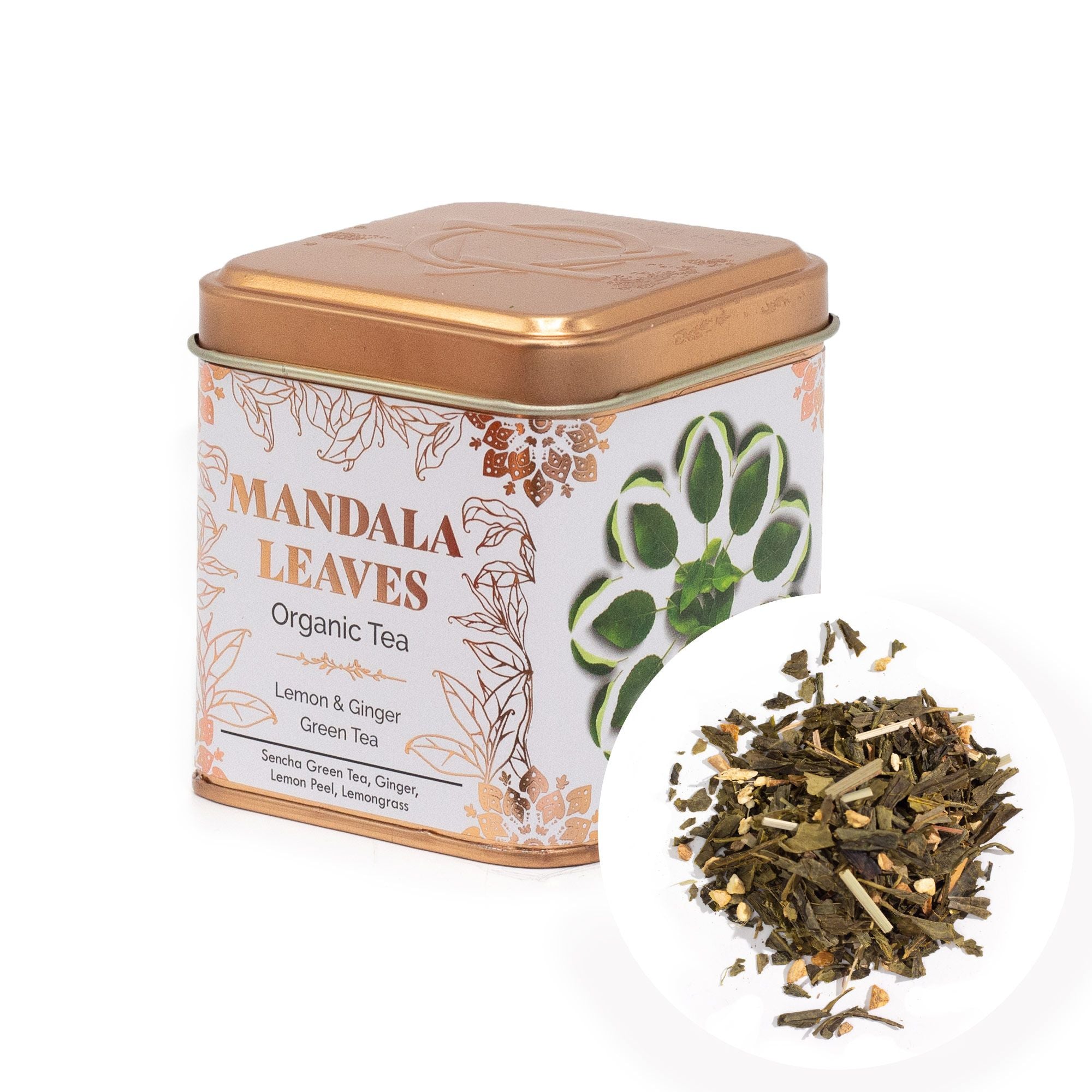 Tea canister labeled 'Mandala Leaves Organic Tea' with a close-up of tea leaves on a white background.