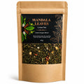 Mandal Leaves loose tea package with visible tea leaves on a white background
