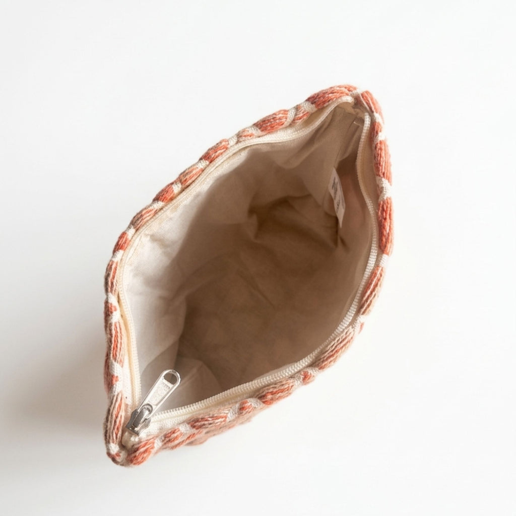 Small pouch with floral pattern on a white background